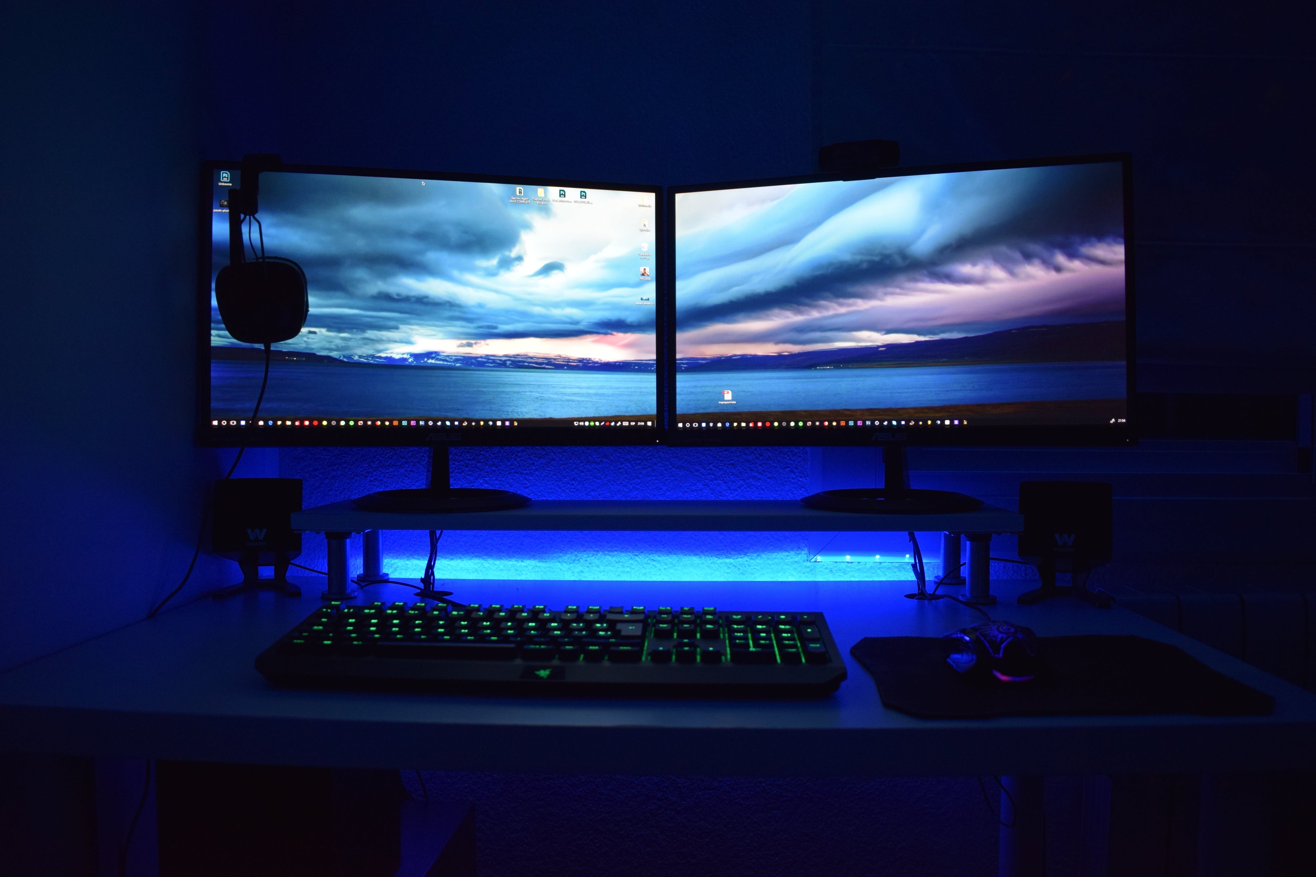 Gaming setup with monitors and headset