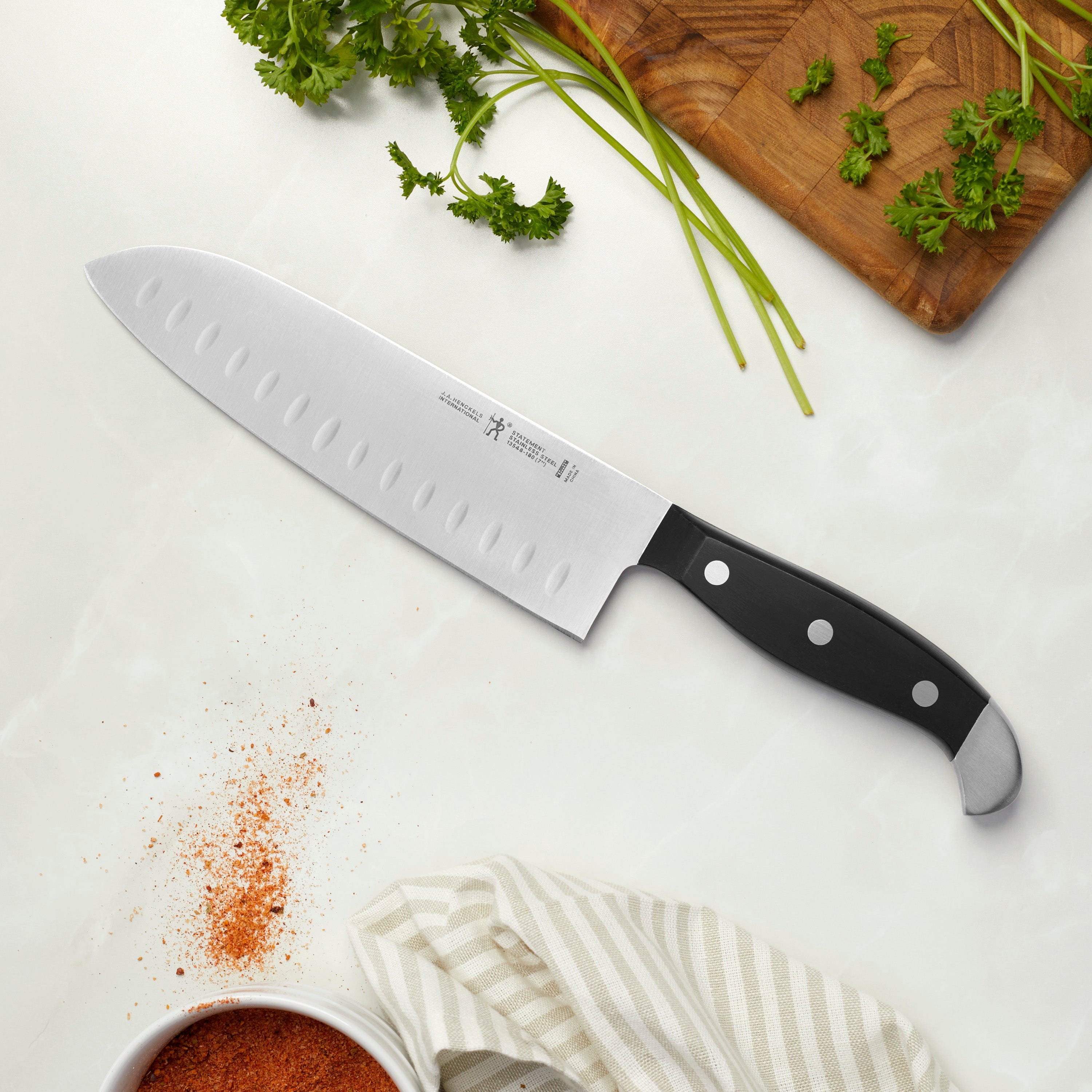 Henckels Statement 7-inch Hollow Edge Santoku Knife