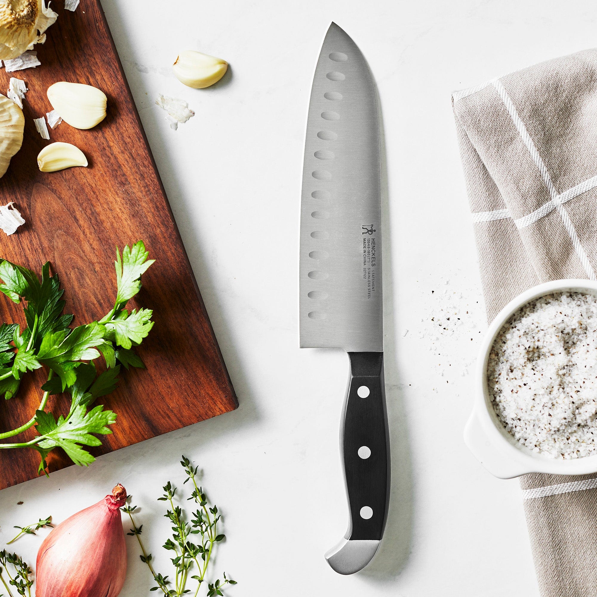 Henckels Statement 7-inch Hollow Edge Santoku Knife