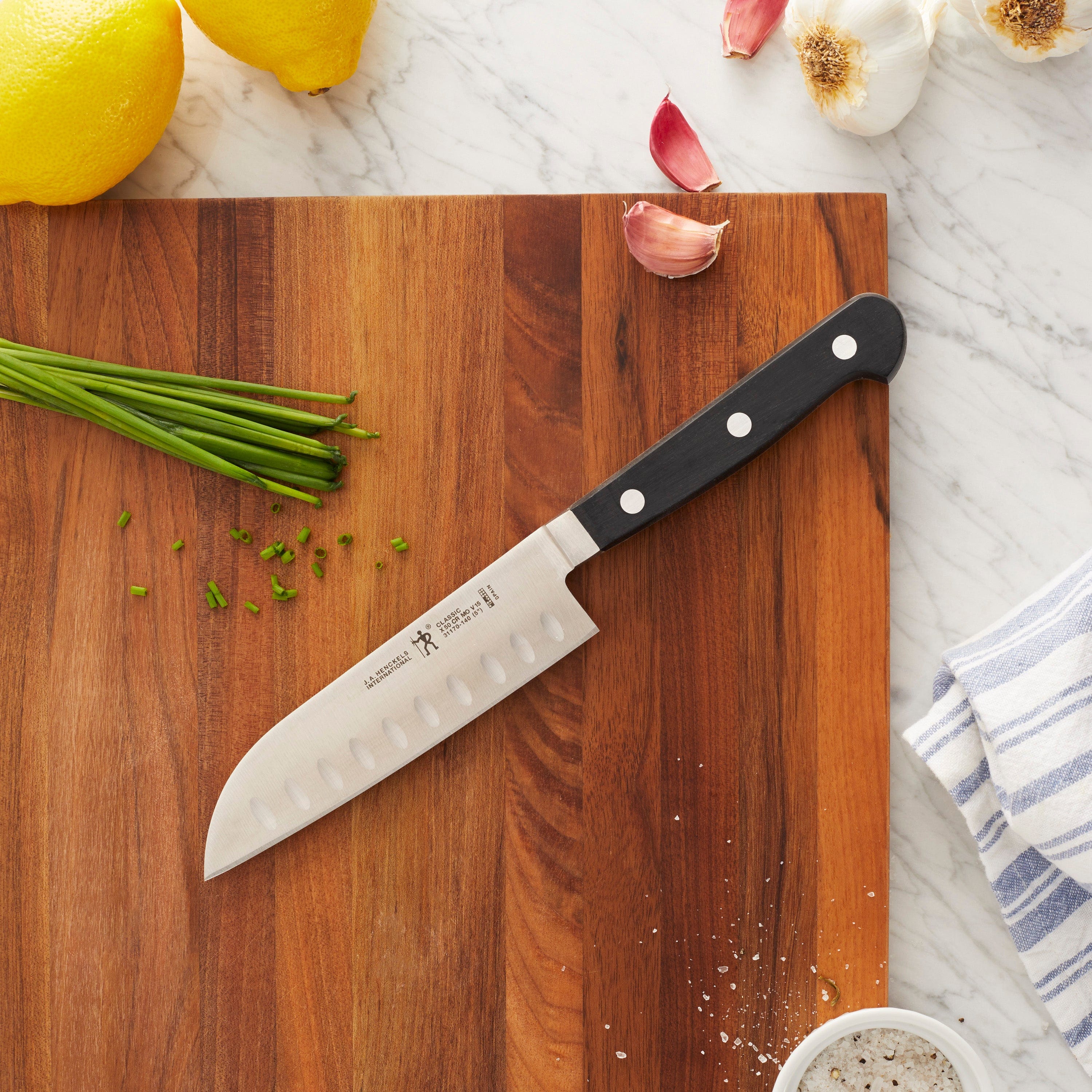 Henckels Classic 5-inch Hollow Edge Santoku Knife