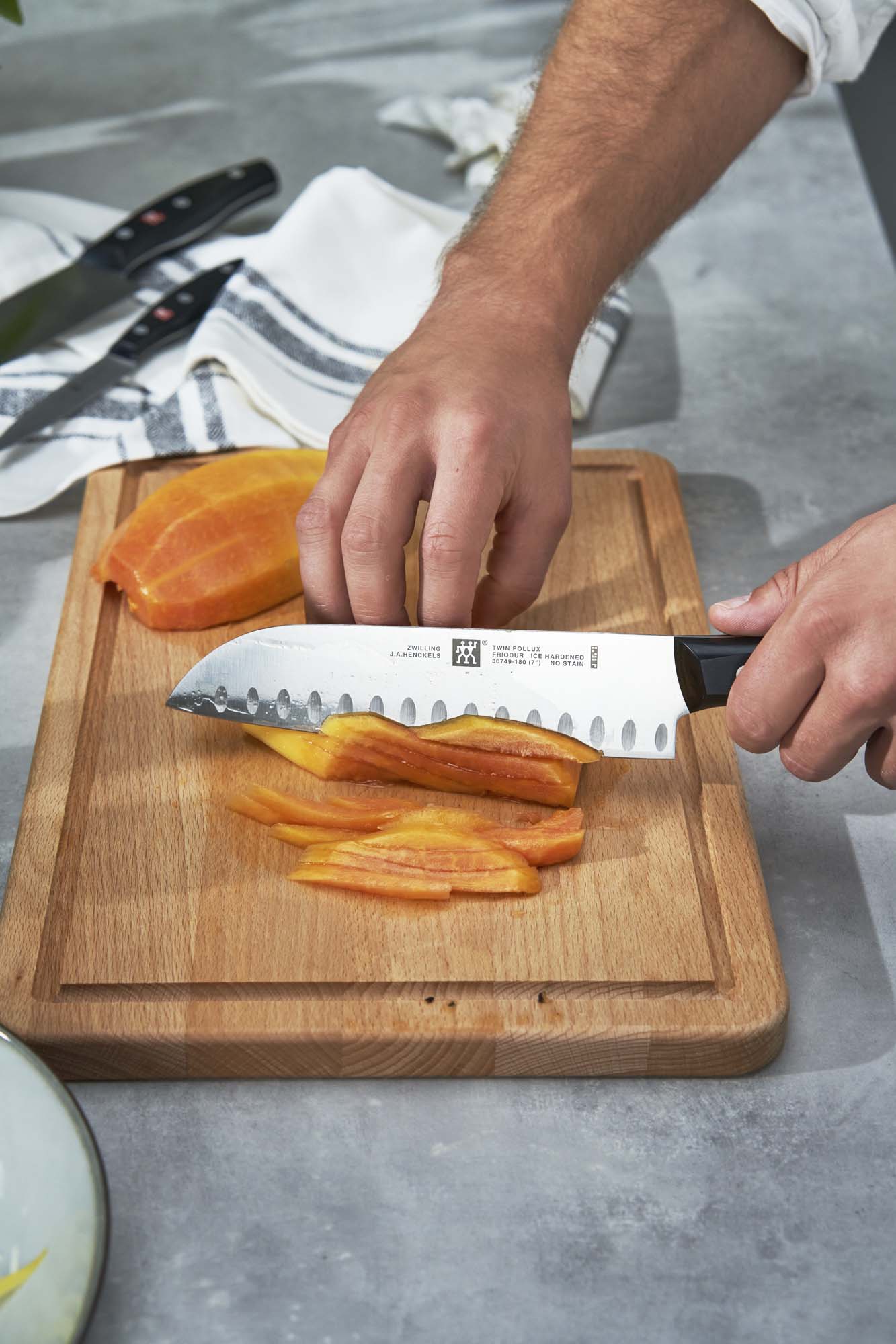 Zwilling Twin Signature 7-inch Hollow Edge Santoku Knife