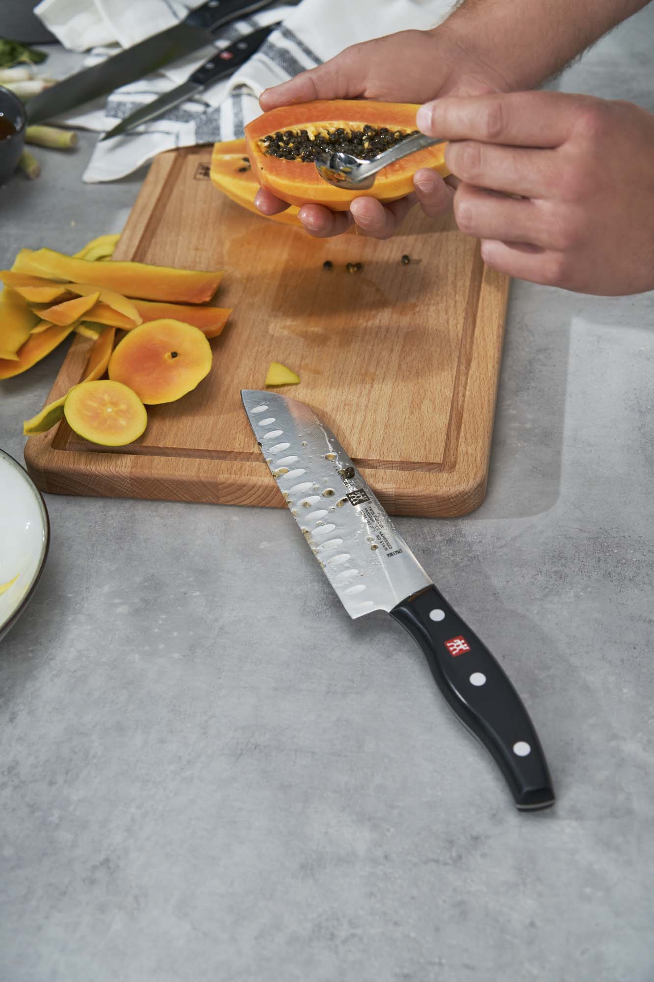 Zwilling Twin Signature 7-inch Hollow Edge Santoku Knife